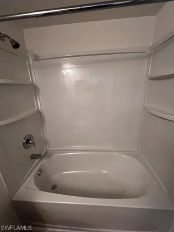 Bathroom with bathtub / shower combination