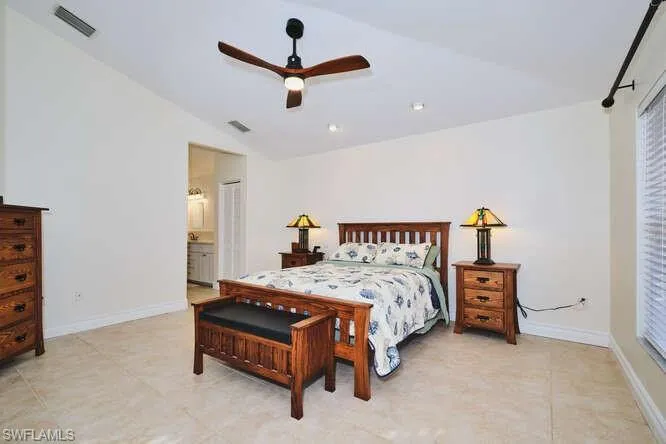 Dining room with plenty of natural light and light tile patterned flooring