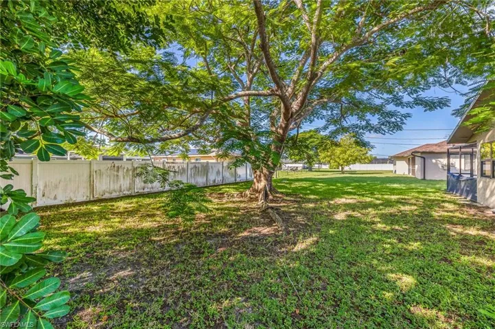 View of fenced backyard