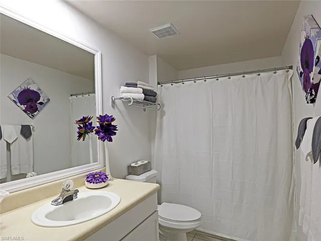 Full bath with vanity and toilet