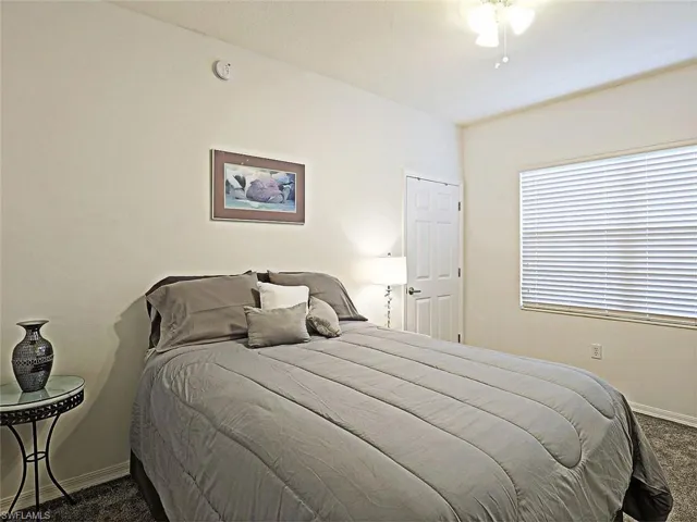 Bedroom with carpet flooring