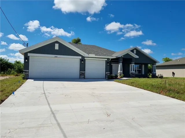 View of front of home with a garage