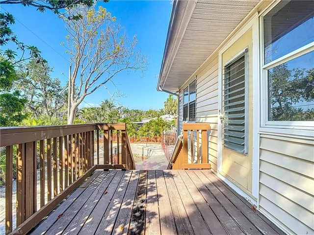 View of wooden deck from Primary bedroom