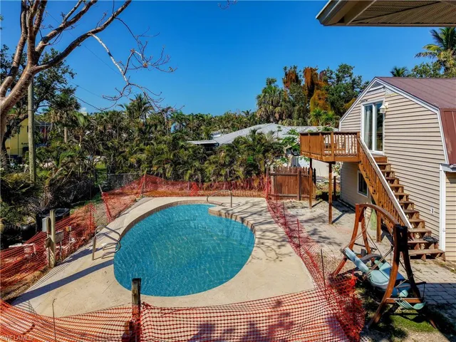 View of pool . This photo is enhanced. Pool needs to be redone.