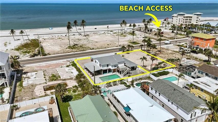 Aerial view of property and surrounding area with property boundaries highlighted and extended coastline neighboring lot can be included in bundle or separately purchased- Virtually Enhanced