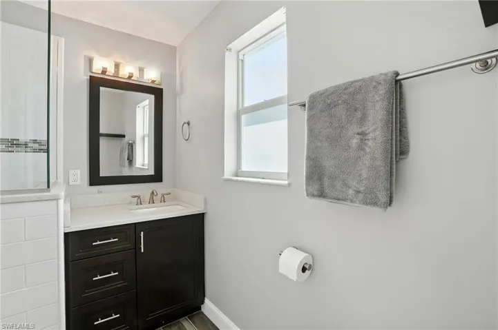 Bathroom featuring vanity- Virtually Enhanced