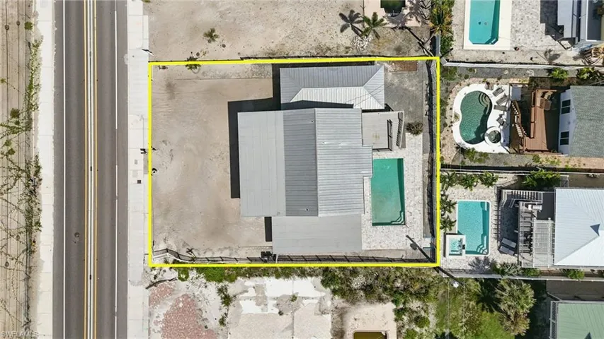 Aerial view of property's location featuring property boundaries highlighted- Virtually Enhanced