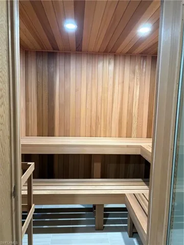 Sauna / steam room with wood ceiling and wood walls - Virtually Edited Image