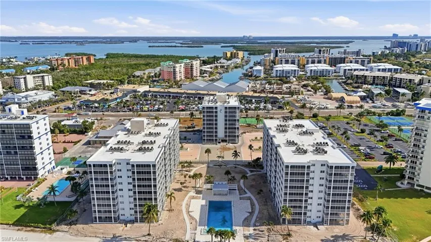 View of urban area featuring a nearby body of water - Virtually Edited Image