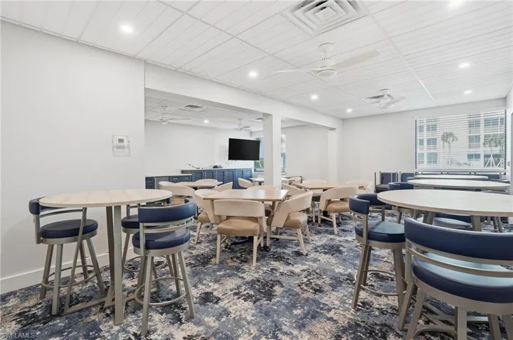 Dining room featuring a ceiling fan and recessed lighting - Virtually Edited Image