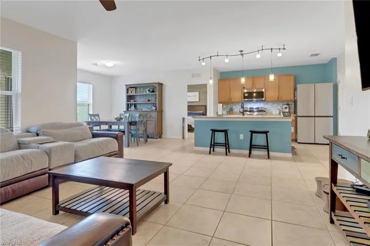 Living room featuring light tile patterned floors