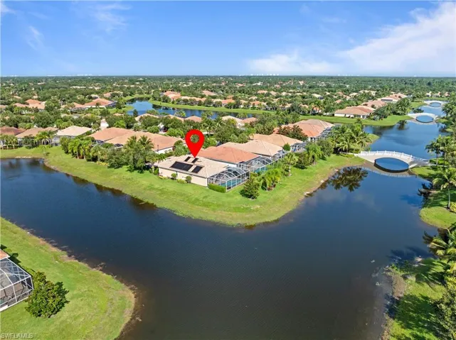 Aerial view of residential area with a nearby body of water