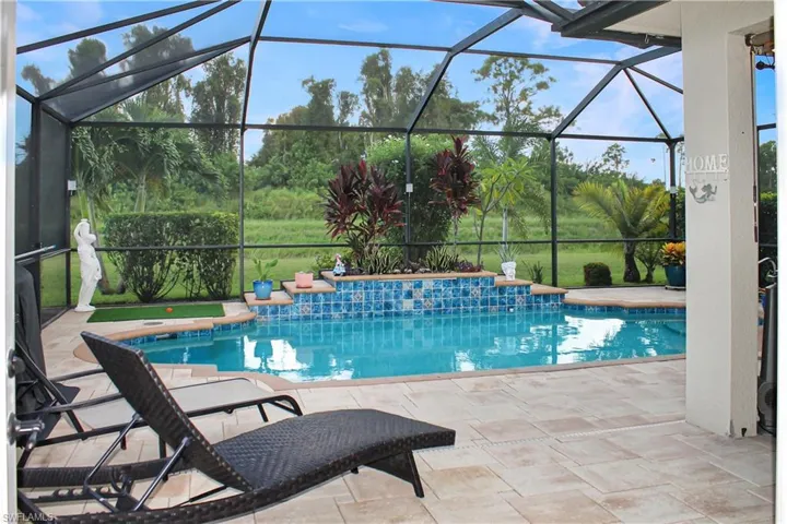 View of pool from primary bedroom