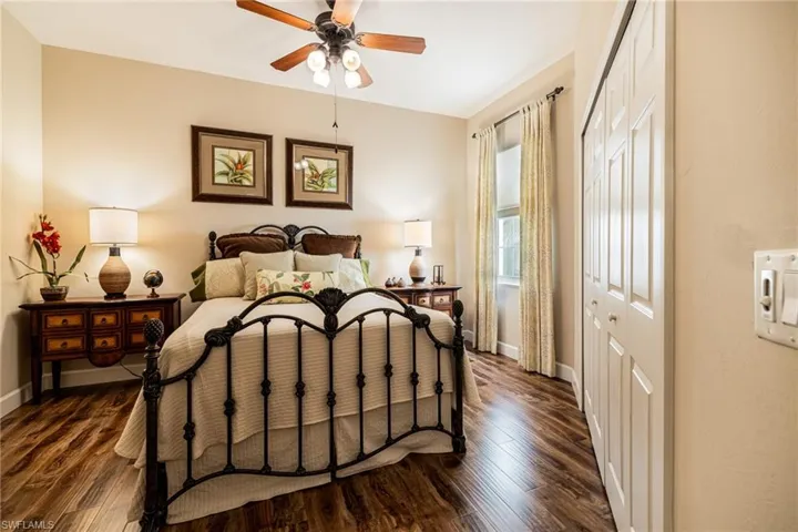 Guest bedroom with laminate floors
