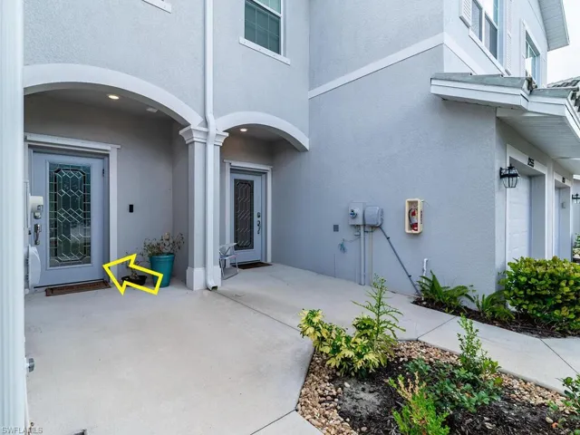 Entrance to property with a garage