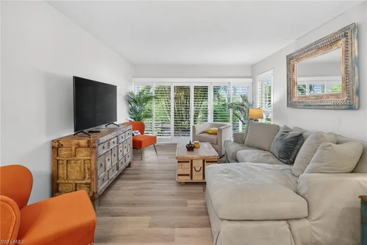 Living area with wood finished floors