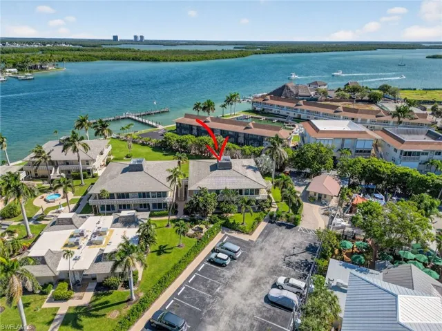 Aerial view of residential area with a nearby body of water