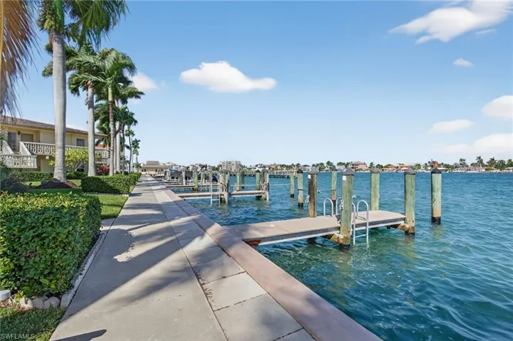 Dock with a water view and boat lift