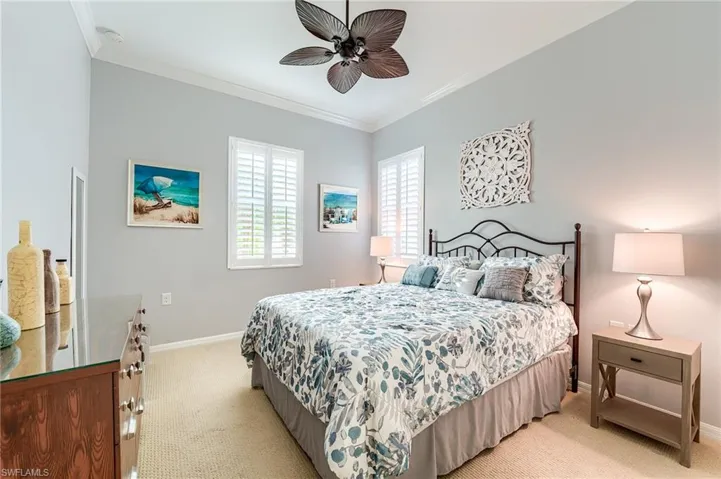 Guest bedroom with plantation shutters