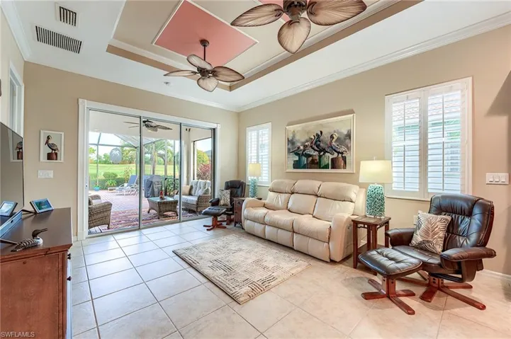 Crown molding and dressed trays with tropical ceiling fans