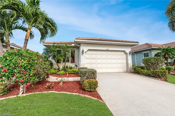 Lush landscaping surrounds this Medina model