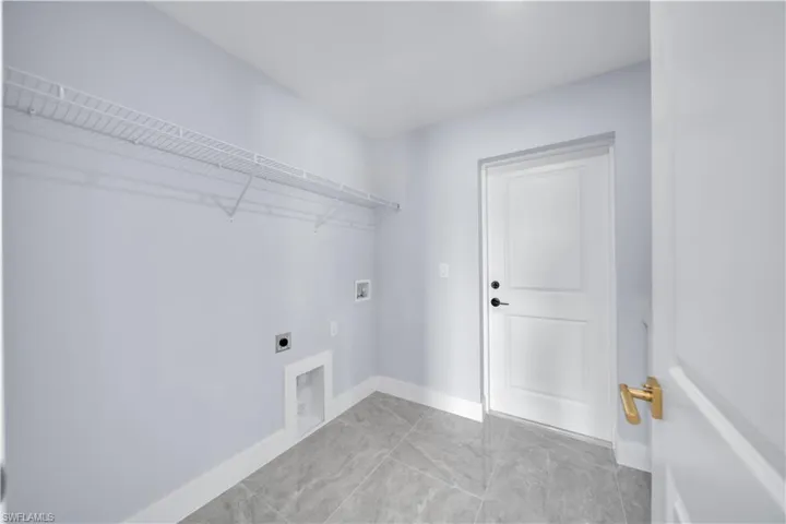 Laundry room featuring hookup for an electric dryer and washer hookup