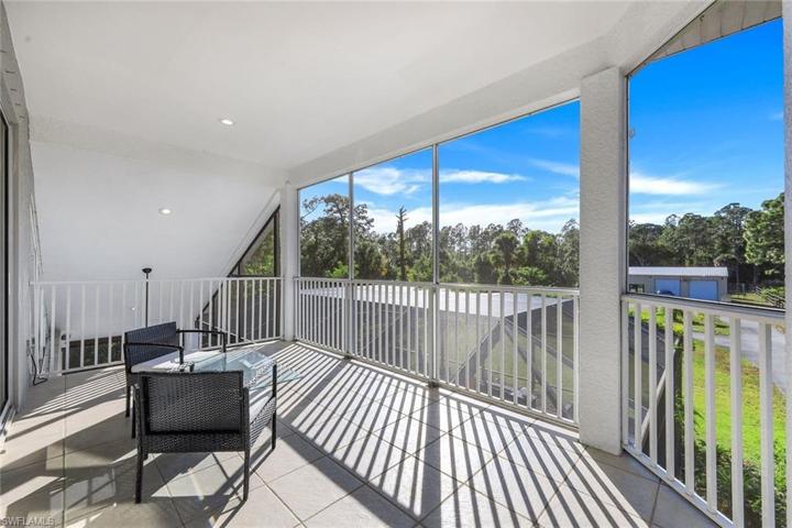 Upstairs screened balcony from loft area