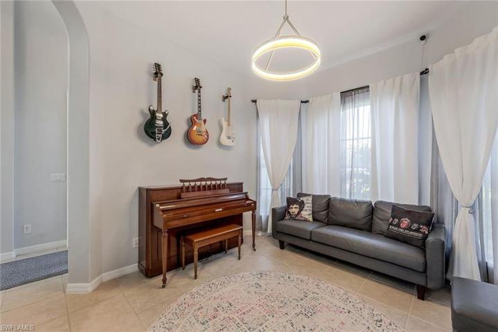 Formal dining/den area off kitchen