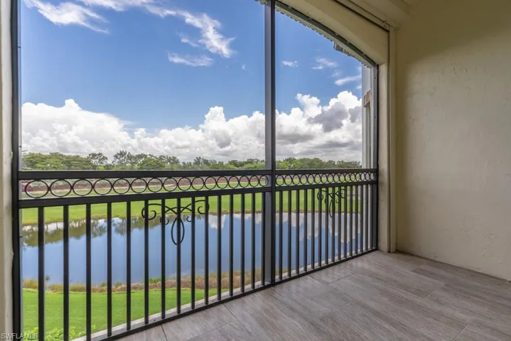 Balcony with a water view off den