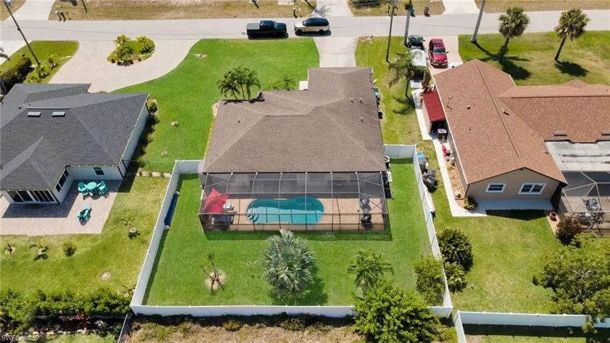 Birds eye view of property with a residential view