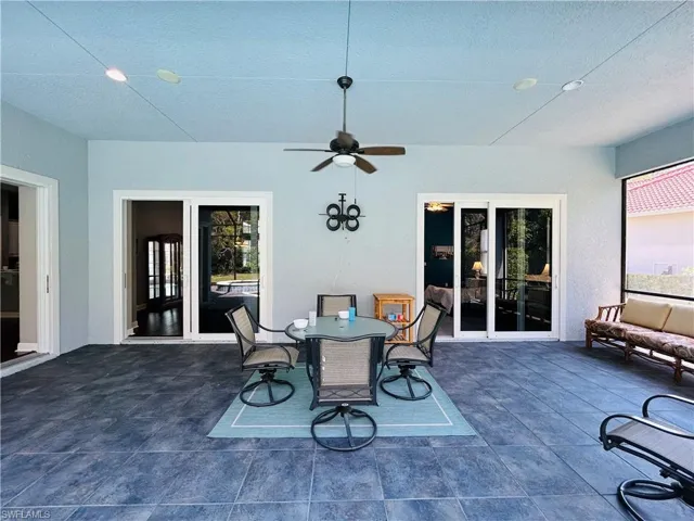 Large Covered Lanai totally screened in with paver floor place for a wall mounted tv several seating dining options comes with everything pictured.