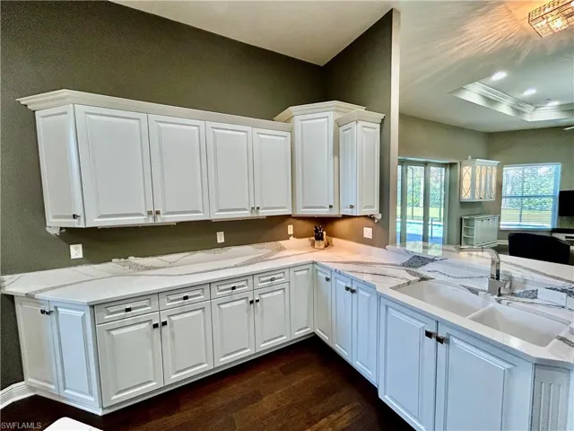 White custom kitchen cabinets are a cook’s dream!  Every extra you could want is here!
