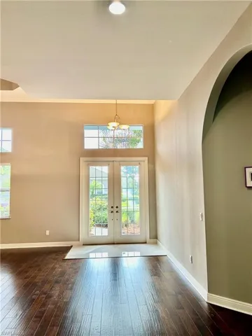View from Great Room looking toward the front of the home have several Arches and lots of natural light.