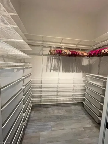 Custom Elfa closet is a shopping woman’s dream! So many drawers and storage options in this great closet.
