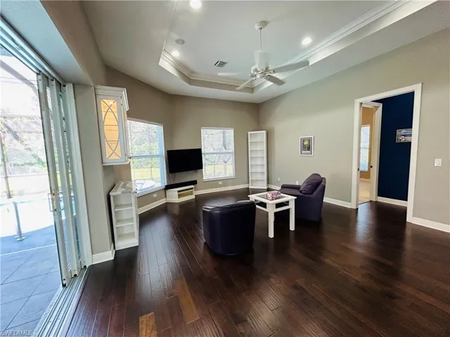 Spacious & is on the other side of the Kitchen so you can be connected to guests. Beautiful ceilings, custom made Dry Bar with Quartz countertop, also lighted.
