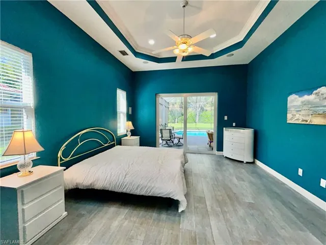 View in master bedroom, looking toward swimming pool.