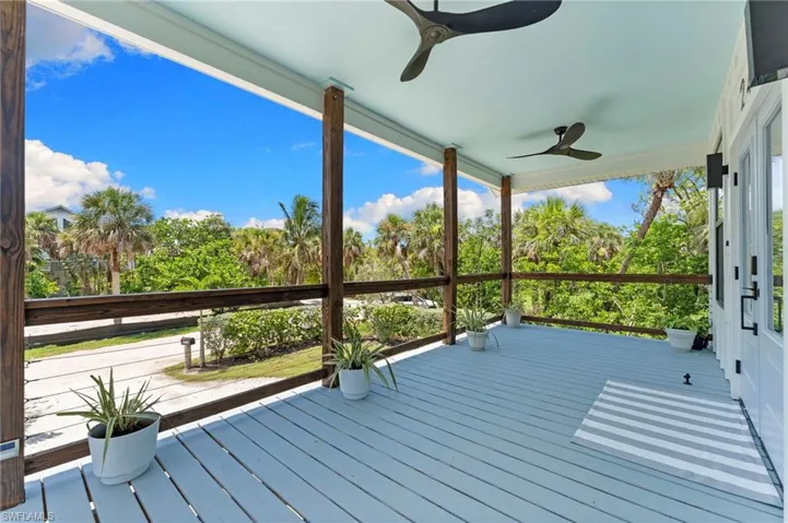 Deck with view of scattered trees