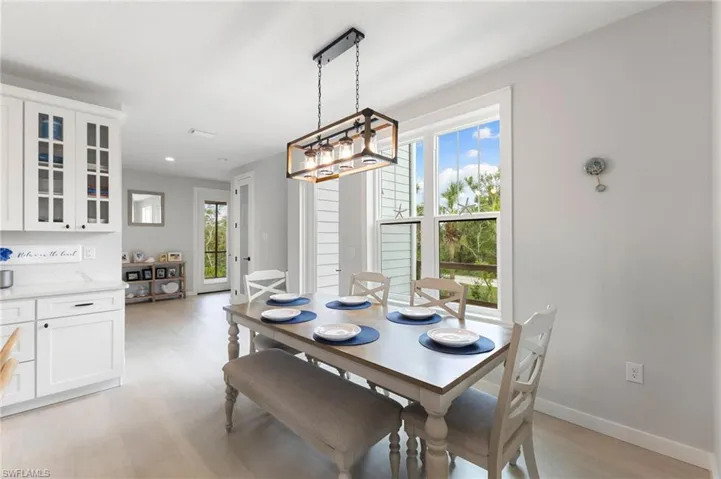 Dining room featuring plenty of natural light and light wood-style flooring