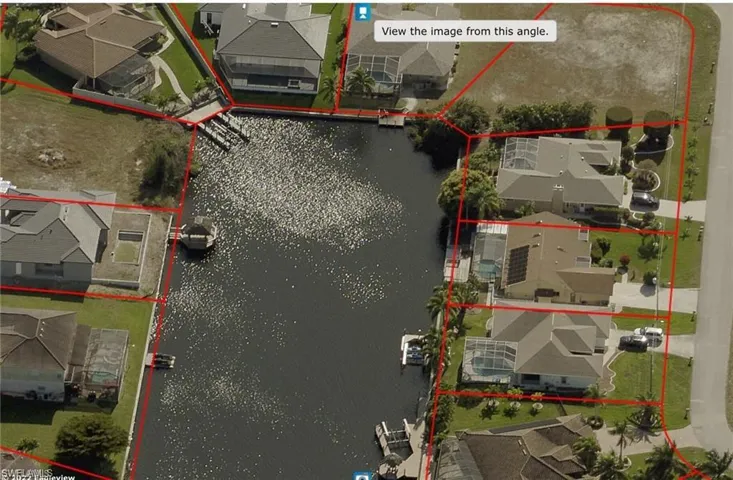Aerial overview of property's location featuring property parcel outlined