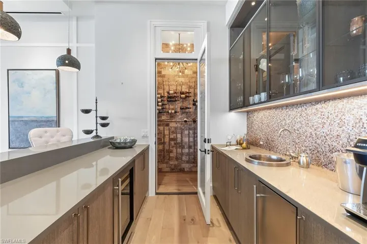 Custom wet bar with wine room