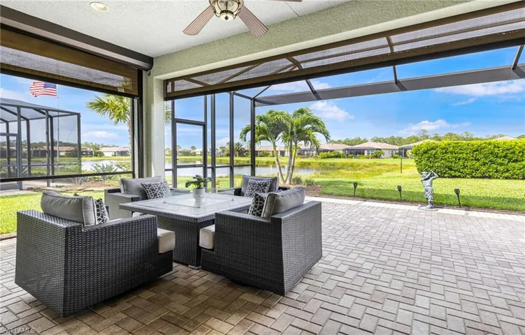 Beautiful lanai with electric storm smart shutters.