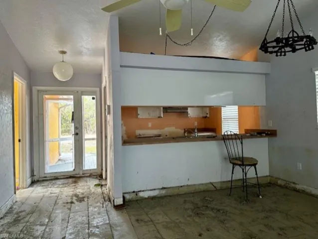 Living Area/ Kitchen/ Entry