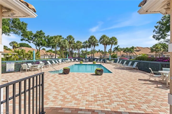 Community pool with a patio area