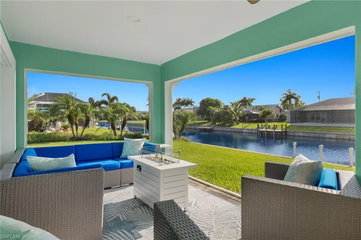 View of terrace featuring a water view and an outdoor living space