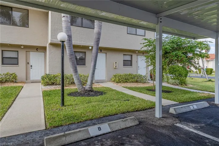 View of front of home featuring a front lawn