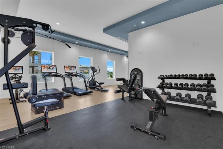 Workout area featuring recessed lighting