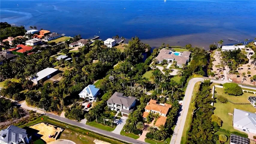This image is an AI-generated conceptual rendering and is not an accurate depiction of the property. Improvements shown may not reflect actual boundaries, setbacks, scale, or permitted uses. Buyer to independently verify all development potential.
