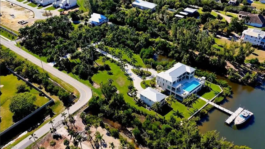 This image is an AI-generated conceptual rendering and is not an accurate depiction of the property. Improvements shown may not reflect actual boundaries, setbacks, scale, or permitted uses. Buyer to independently verify all development potential.