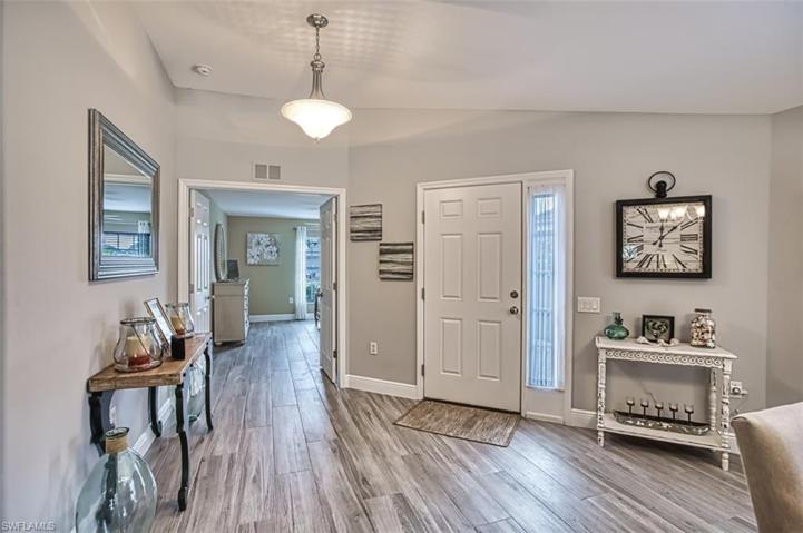 Entry - home features beautiful plank tile