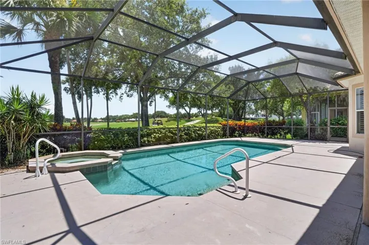 Relax on your pool deck and lanai while enjoying peaceful views of the 9th hole and the lake beyond.